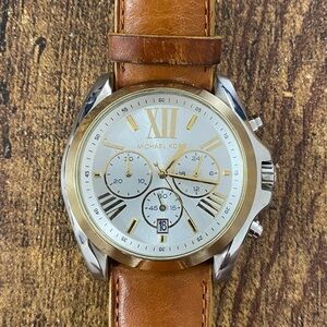 Sleek Michael Kors leather band watch.